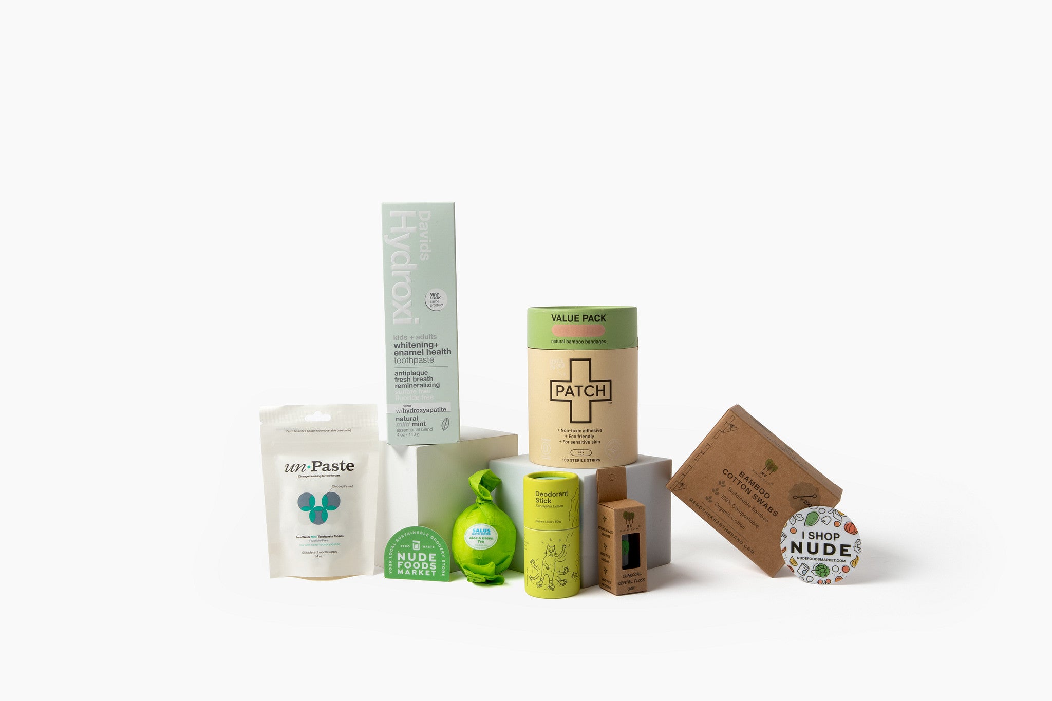 Nude Foods Market founders in front of zero waste grocery storefront